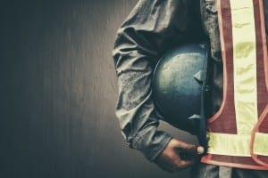 Man holding blue helmet close up