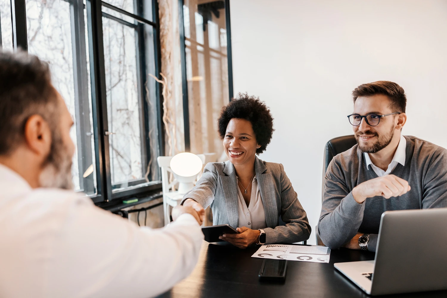 business partners meeting corporate firm multicultural business people shaking hands